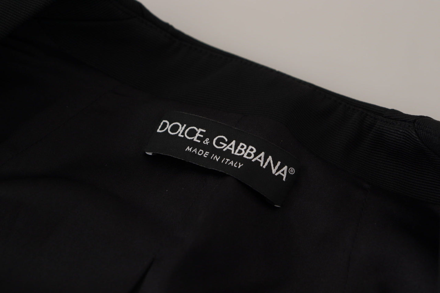 Dolce & Gabbana Strak zwart jack met drukknopen en zijden voering