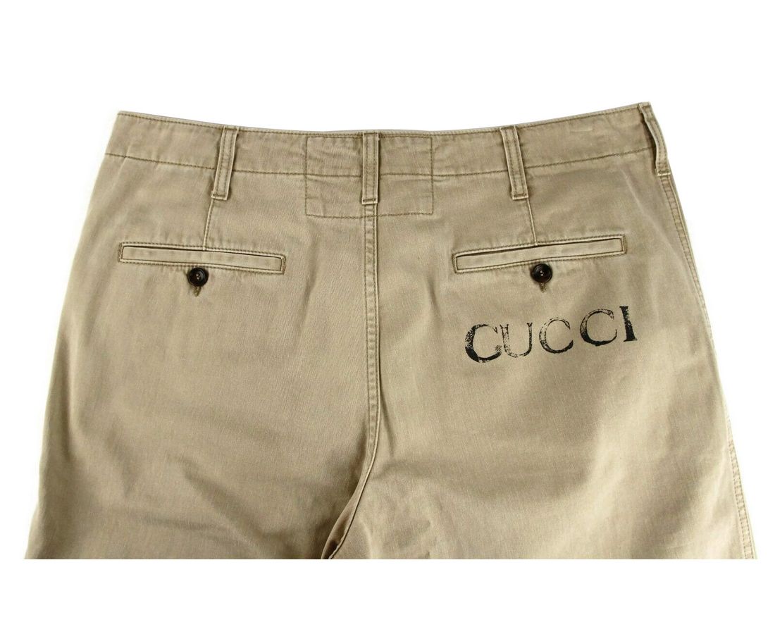 Lichtbruine gewassen katoenen broek met Gucci-print